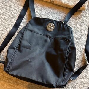 Baggallini black backpack purse.